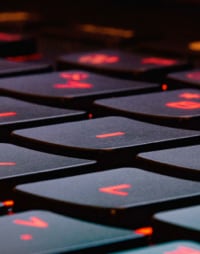 laptop keyboard with red lights